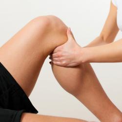 Sports injury treatment of calf and knee photo